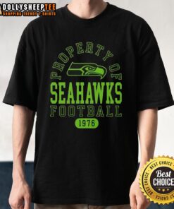 Alt Text: Official Property Of Seattle Seahawks Football Since 1976 T-Shirt in blue and green, showcasing team pride and heritage.