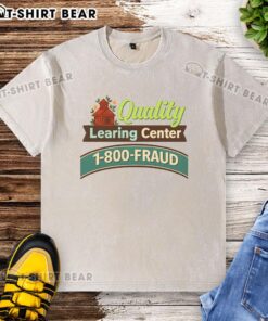 Official Quality Learning Center 1-800 Fraud Washed T-Shirt featuring a bold graphic design and vibrant colors.