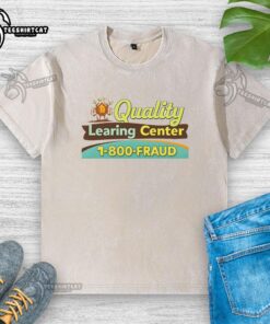 Official quality learning center fraud funny washed t-shirt featuring a humorous design for casual wear.