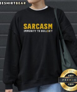 Official Sarcasm Immunity to Bullshit Sweatshirt in black with bold white lettering, perfect for sarcasm lovers.