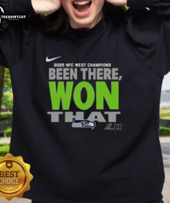 Official Seattle Seahawks 2025 NFC West Champions sweatshirt featuring team logo and vibrant colors, perfect for fans.