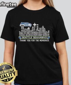 Seattle Seahawks ladies tee featuring a city skyline design, celebrating team spirit and memories in Seattle.