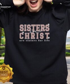 Official Sisters in Christ Are Sisters for Life sweatshirt in a cozy setting, perfect for faith-inspired fashion.