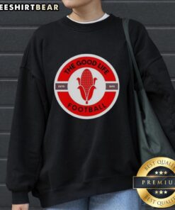 Alt Text: Official The Good Life Nebraska Cornhuskers logo sweatshirt showcasing team spirit and style for fans.