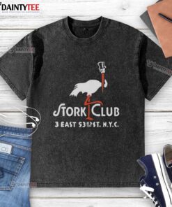 Alt Text: Vintage Stork Club logo on a washed t-shirt, showcasing the iconic East New York City restaurant design.