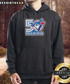 Alt Text: Official Toronto Blue Jays 50 Seasons logo hoodie showcasing team pride and heritage in stylish design.