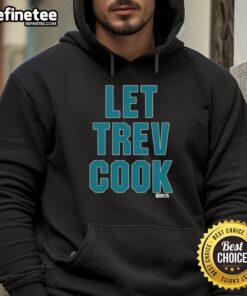 Alt Text: Official Trevor Lawrence Let Trev Cook hoodie featuring Jacksonville Jaguars colors and logo, perfect for fans.