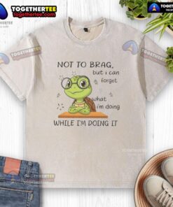 Official Turtle Not To Brag But I Can Forget Washed T-Shirt in vibrant colors, perfect for casual wear.