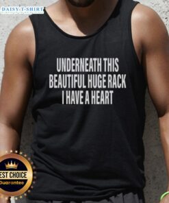 Woman wearing 'Official Underneath This Beautiful Huge Rack I Have A Heart' tank top, showcasing a stylish casual look.