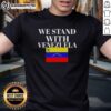 Alt Text: Official We Stand With Venezuela Flag T-Shirt featuring a bold design with the Venezuelan flag colors and message.
