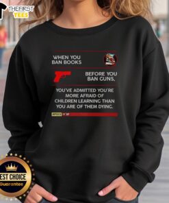 Official sweatshirt featuring the quote on banning books and guns, highlighting concerns about children's learning.
