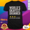Official World's Okayest Drummer Hits Stuff Mostly On Purpose T-Shirt design featuring humorous drumming graphic.