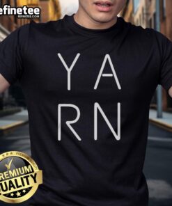 Alt Text: Official Y A R N Logo T-Shirt featuring a stylish design and vibrant colors, perfect for yarn enthusiasts and crafters.