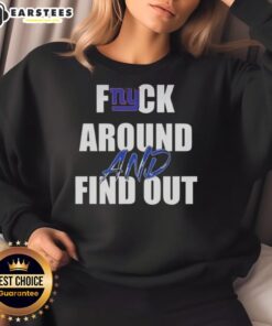 Original Fck Around And Find Out New York Giants Sweatshirt featuring bold graphics and team colors, perfect for fans.