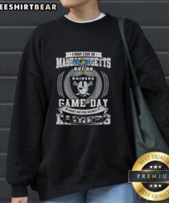 Alt Text: Original sweatshirt featuring I May Live In Massachusetts, But On Game Day My Heart Belongs To Las Vegas Raiders.