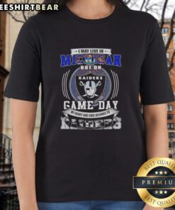 Original ladies tee with 'I May Live In Michigan But My Heart Belongs To Las Vegas Raiders Football' design.