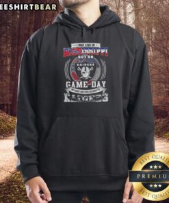 Alt Text: Fan wearing a 'I May Live In Mississippi But On Game Day My Heart and Soul Belongs To Las Vegas Raiders' hoodie.
