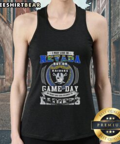Alt Text: Woman wearing a tank top that says 'I May Live In Nevada But My Heart Belongs To Las Vegas Raiders Football'