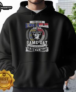 Alt Text: Cozy hoodie with 'I May Live In North Carolina But On Game Day My Heart Belongs To Las Vegas Raiders' design.