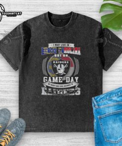 Washed t-shirt featuring 'I May Live In North Carolina But On Game Day My Heart Belongs To Las Vegas Raiders' design.