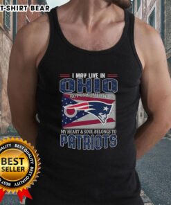 Alt Text: Woman wearing a New England Patriots flag tank top, showcasing team spirit while living in Ohio on game day.