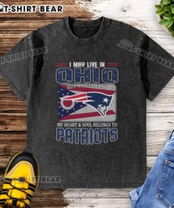 Alt Text: Ohio fan wearing a washed t-shirt with New England Patriots flag, showcasing team spirit on game day.