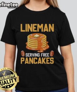 Original Lineman serving free pancakes at event, featuring ladies in themed tee shirts enjoying the festive atmosphere.