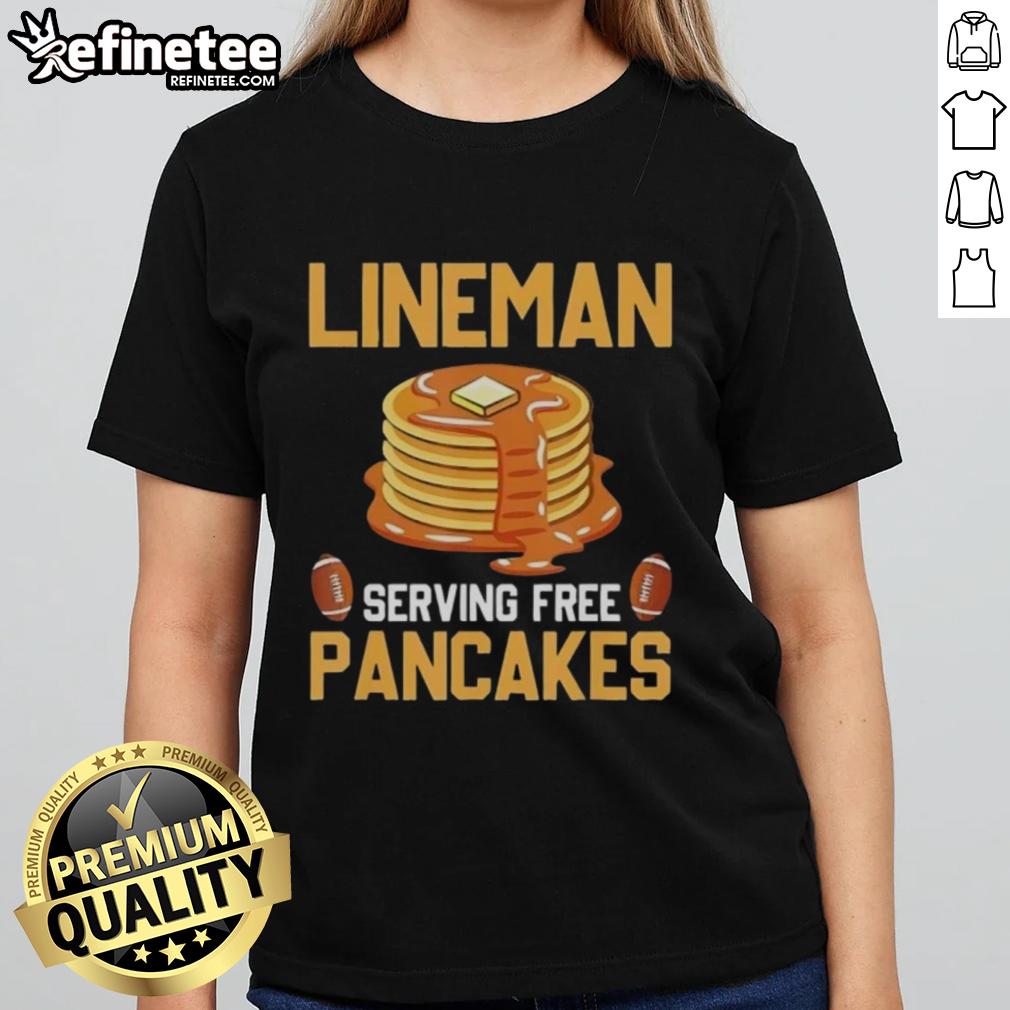 original-lineman-serving-free-pancakes-ladies-tee Original Lineman serving free pancakes at event, featuring ladies in themed tee shirts enjoying the festive atmosphere.