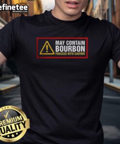 Alt Text: Original May Contain Bourbon Proceed With Caution T-Shirt featuring a fun graphic for bourbon lovers. Stylish and casual wear.