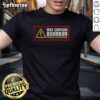 Alt Text: Original May Contain Bourbon Proceed With Caution T-Shirt featuring a fun graphic for bourbon lovers. Stylish and casual wear.