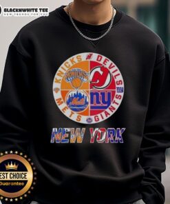 Alt Text: Original New York City sports sweatshirt featuring logos of Knicks, Devils, Giants, and Mets in a stylish design.