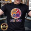 Alt Text: Original New York City Sports t-shirt featuring Knicks, Devils, Giants, and Mets logos in a stylish design.