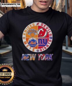 Alt Text: Original New York City Sports t-shirt featuring Knicks, Devils, Giants, and Mets logos in a stylish design.