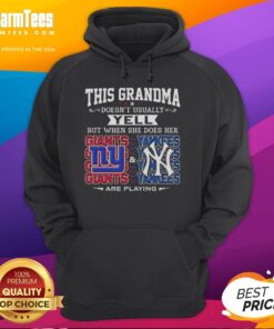 Grandma wearing a hoodie supporting New York Giants and Yankees, showing her team spirit with a playful yell.