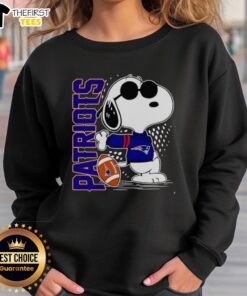 Original Peanuts Snoopy x New England Patriots football sweatshirt featuring Snoopy in team colors.