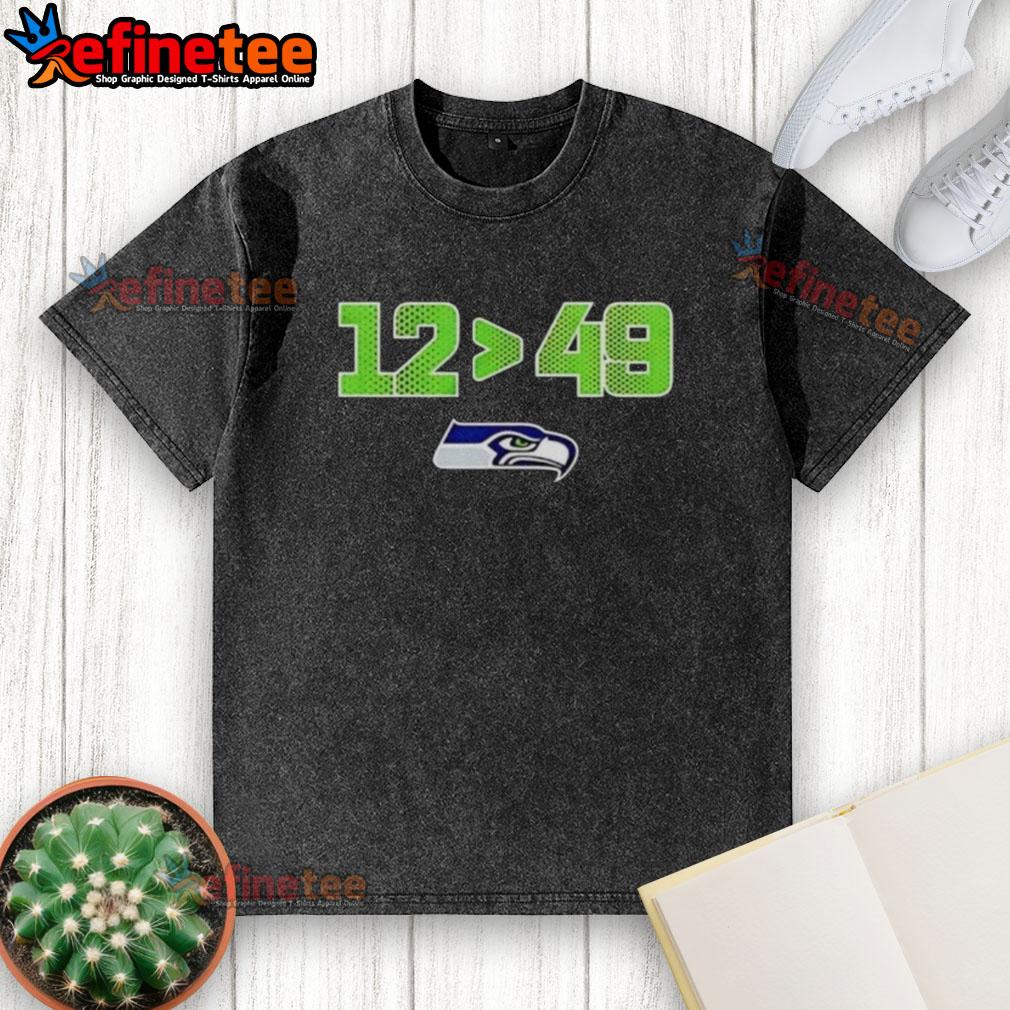original-seattle-seahawks-12-is-greater-than-49-2025-nfc-west-division-champions-skyline-washed-t-shirt Alt Text: Original Seattle Seahawks 12 Greater Than 49 T-Shirt celebrating 2025 NFC West Division Champions with skyline design.