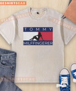Alt Text: Original Shadow Girl Tommy Milffingerer logo on a washed t-shirt, showcasing a trendy and unique graphic design.