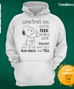 Snoopy hoodie with the quote 'Sometimes you gotta feed people some bullsht' displayed in bold lettering.