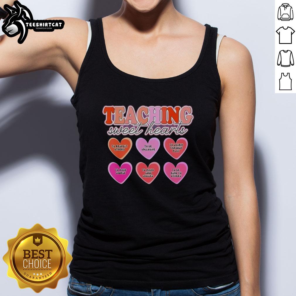 original-teaching-sweet-hearts-to-respect-others-to-be-inclusive-to-learn-through-play-tank-top Child wearing 'Teaching Sweet Hearts' tank top, promoting respect, inclusivity, and learning through play.