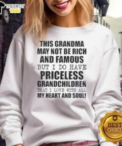 Cozy sweatshirt reading 'This Grandma May Not Be Rich And Famous But I Do Have Priceless Grandchildren' in soft fabric.
