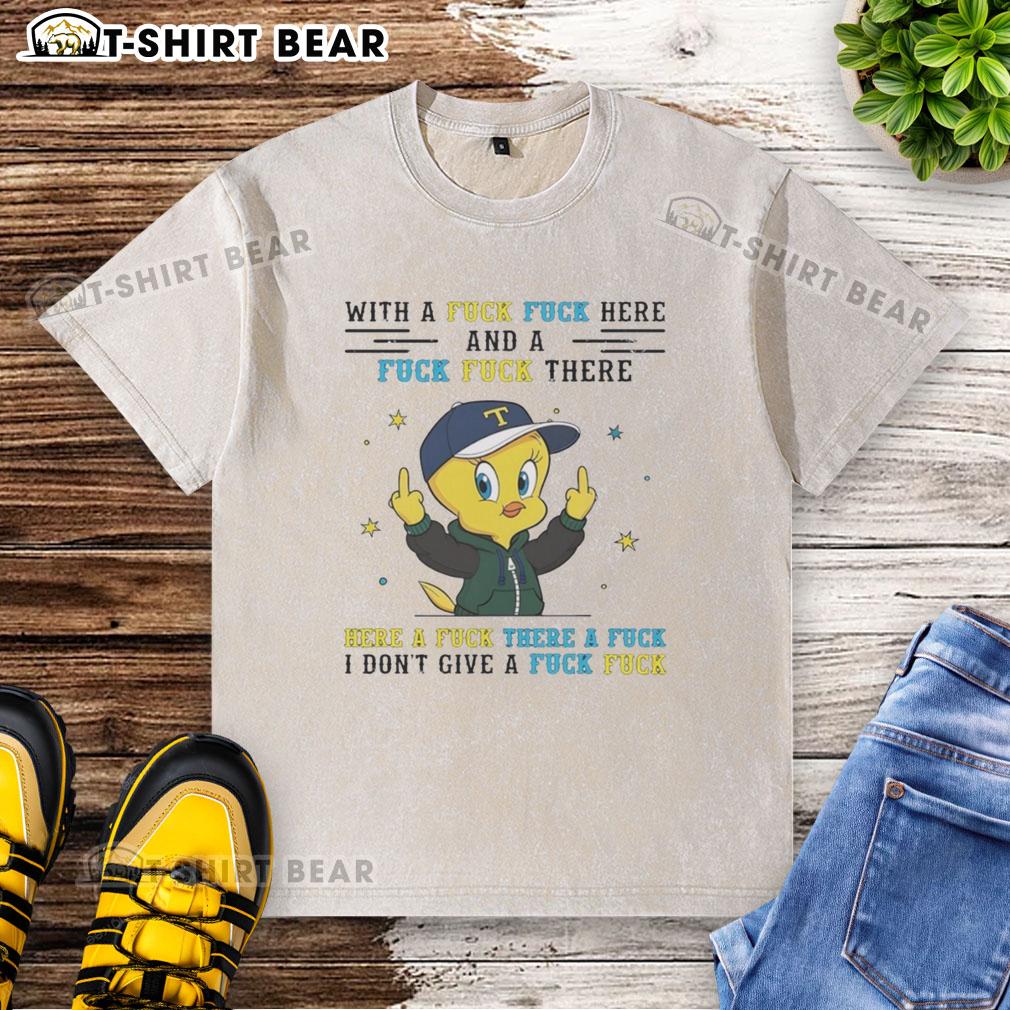 Original Tweety Bird Middle Finger With A Fck Fck Here And A Fck Fck There Washed T-Shirt Alt Text: Original Tweety Bird middle finger graphic on a washed t-shirt with playful 'Fck Fck' text design.