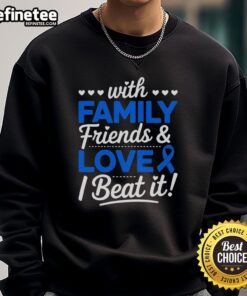 Survivor in 'Beat It' sweatshirt with family and friends, celebrating colon cancer awareness with blue ribbons.