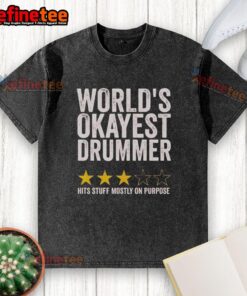 Original Worlds Okayest Drummer hits stuff on purpose, featured on a trendy washed t-shirt design with three stars.