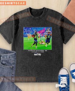 Alt Text: Original Seattle Seahawks Rashid Shaheed NFL Flash Features Washed T-Shirt in blue with team logo and player name.