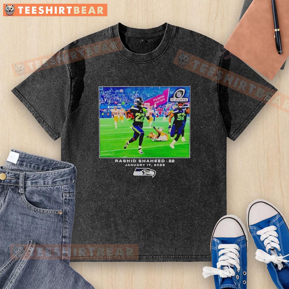 orignal-seattle-seahawks-rashid-shaheed-nfl-flash-features-washed-t-shirt Alt Text: Original Seattle Seahawks Rashid Shaheed NFL Flash Features Washed T-Shirt in blue with team logo and player name.