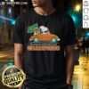 Alt Text: Premium 2025 Goodyear Cotton Bowl Classic Champions T-Shirt featuring Snoopy driving a car for Miami Hurricanes football.