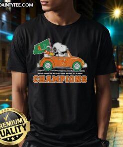 Alt Text: Premium 2025 Goodyear Cotton Bowl Classic Champions T-Shirt featuring Snoopy driving a car for Miami Hurricanes football.