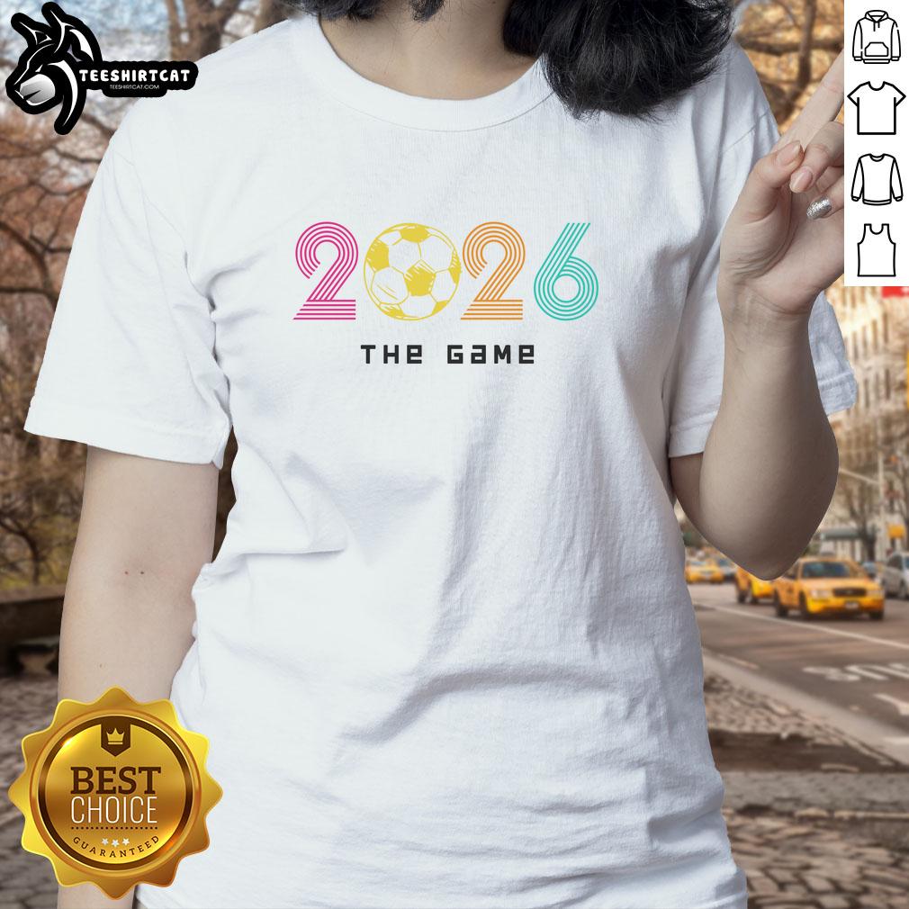 premium-2026-soccer-the-game-ladies-tee Alt Text: Premium 2026 Soccer The Game Ladies Tee featuring stylish design and comfortable fit for soccer enthusiasts.