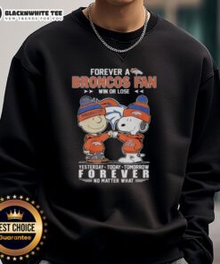 Premium Charlie Brown fist bump with Snoopy, celebrating Denver Broncos fandom in a stylish sweatshirt.