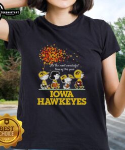Premium Charlie Brown Sally Brown Snoopy Woodstock Iowa Hawkeyes tee for ladies celebrating the most wonderful time.
